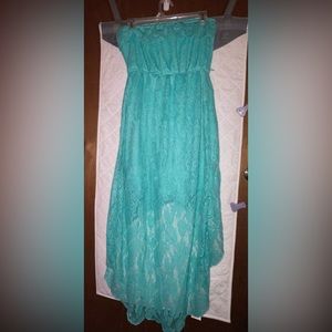 Teal blue strapless dress.